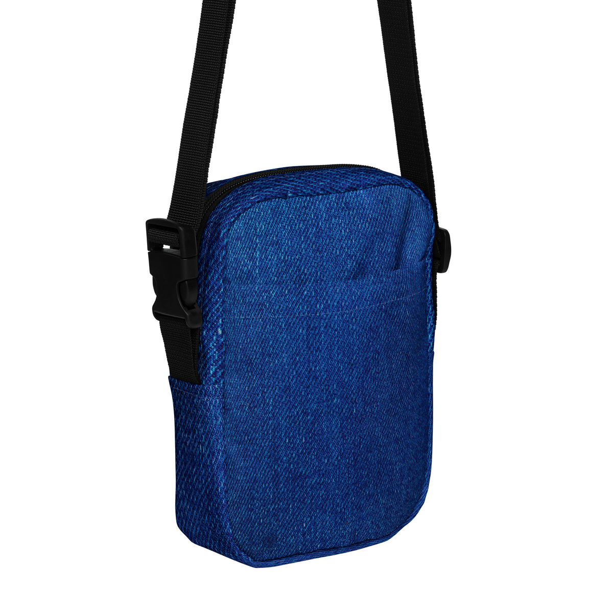 Denim crossbody bag, angled front view showing the zipper and outer pocket