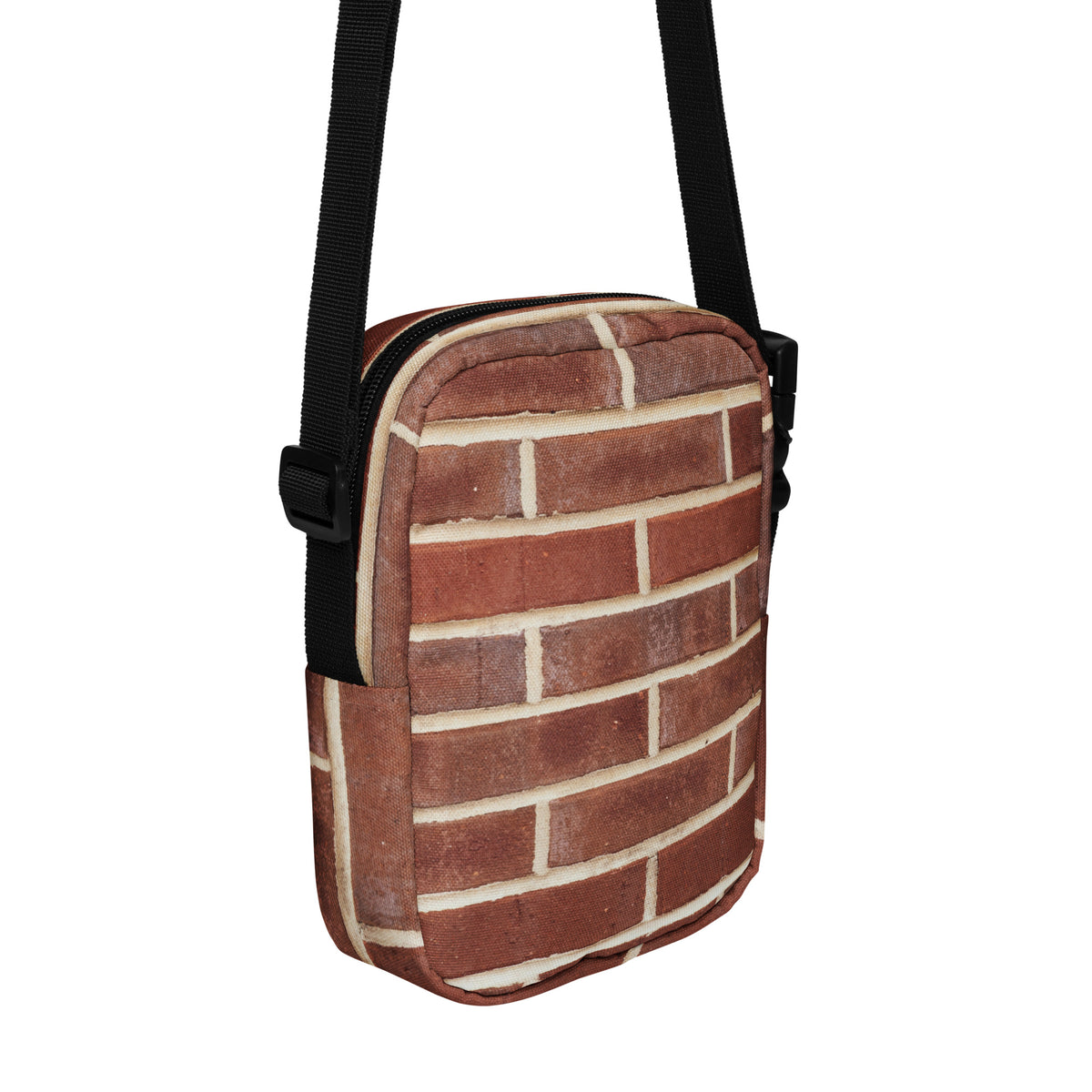 Brick crossbody bag, hanging angled view showing the rear panel