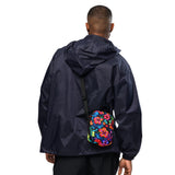 Neon Floral crossbody bag, hanging front view with the strap extended