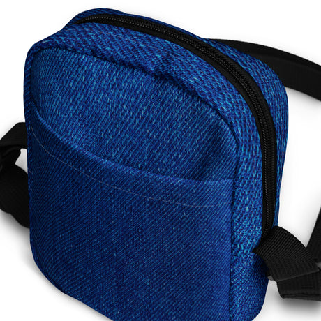 Close-up of the Denim crossbody bag corner stitching and zipper edge
