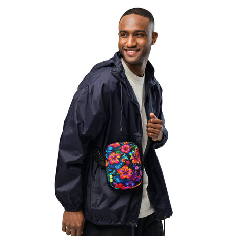 Neon Floral crossbody bag worn across the chest by a smiling model